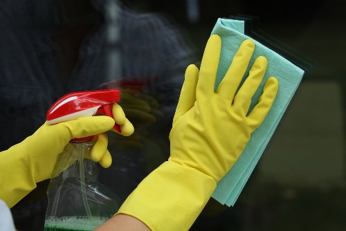 Professional office cleaning in a modern workplace reception area
