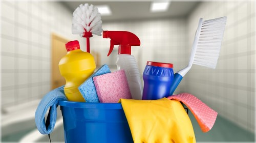 Professional commercial cleaning team maintaining a modern office lobby