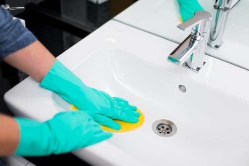 Weekly office cleaning routine in shared workspace areas